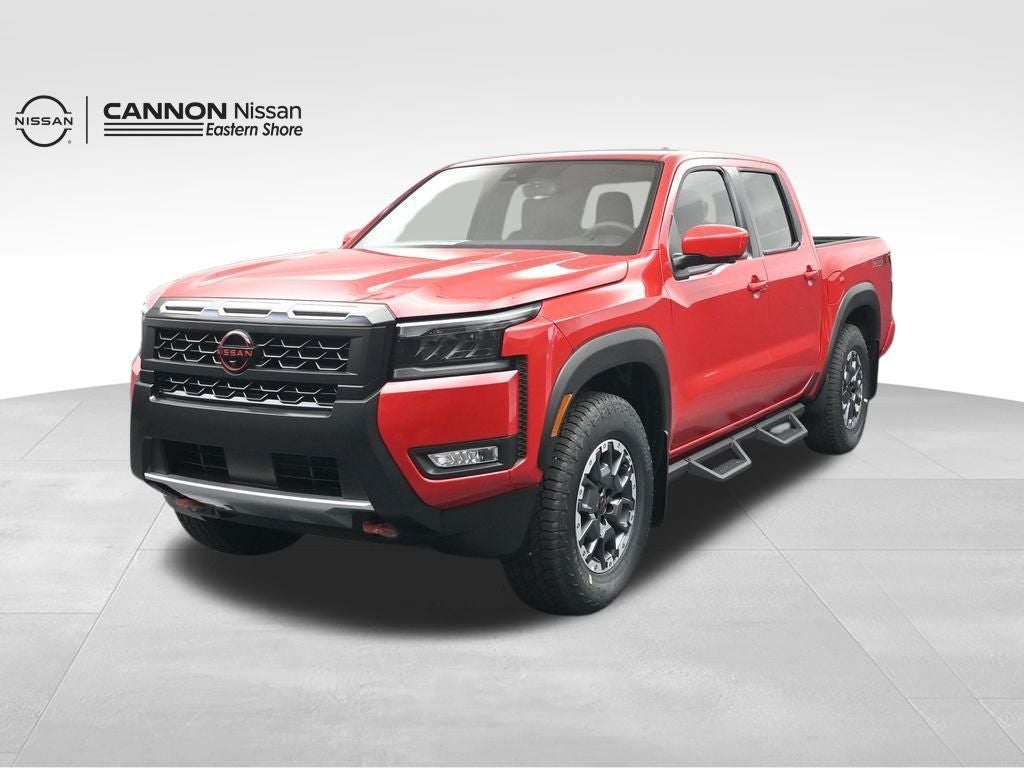 2026 Nissan Frontier PRO-X in Red Alert — front three-quarter view