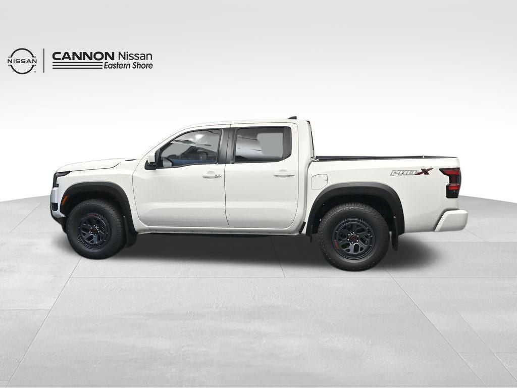 2026 Nissan Frontier — rear three-quarter view