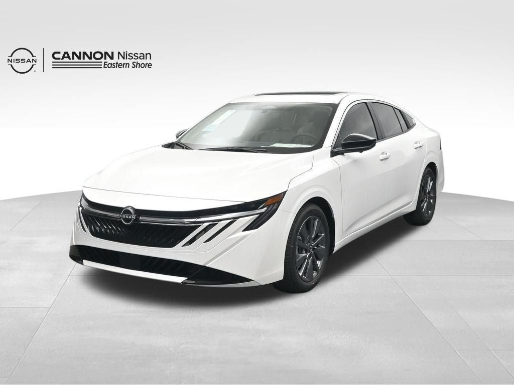 2026 Nissan Sentra SL in Aspen White Tricoat — front three-quarter view