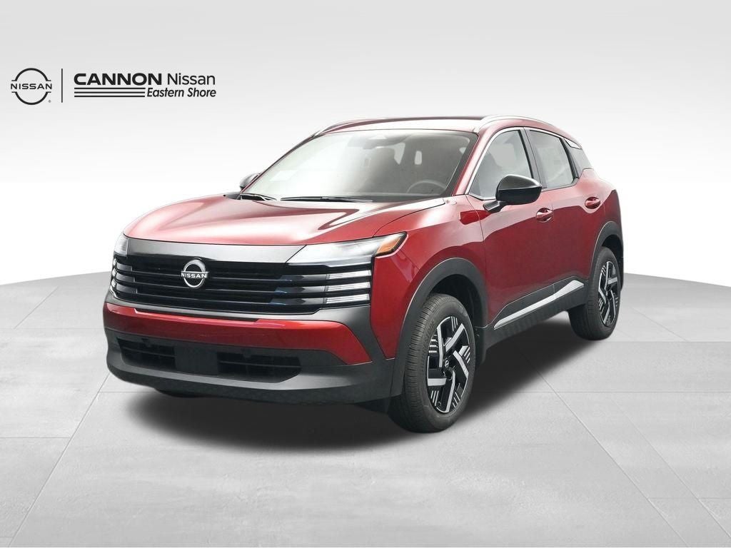 2026 Nissan Kicks SV in Scarlet Ember Tintcoat — front three-quarter view