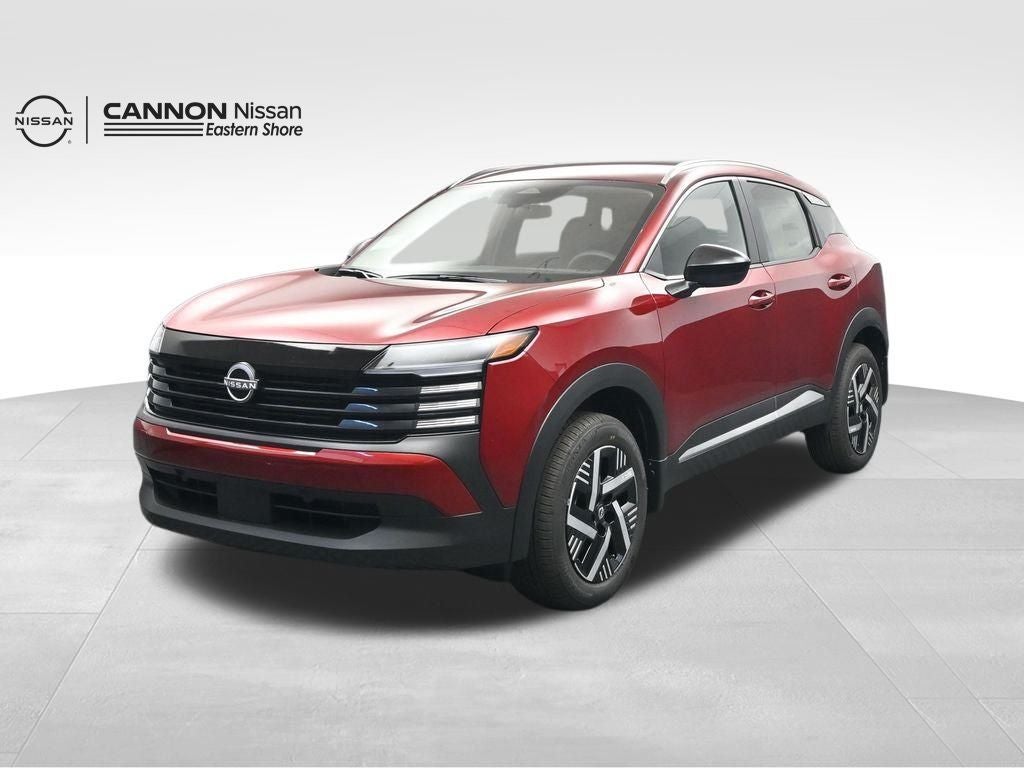 2026 Nissan Kicks SV in Scarlet Ember Tintcoat — front three-quarter view