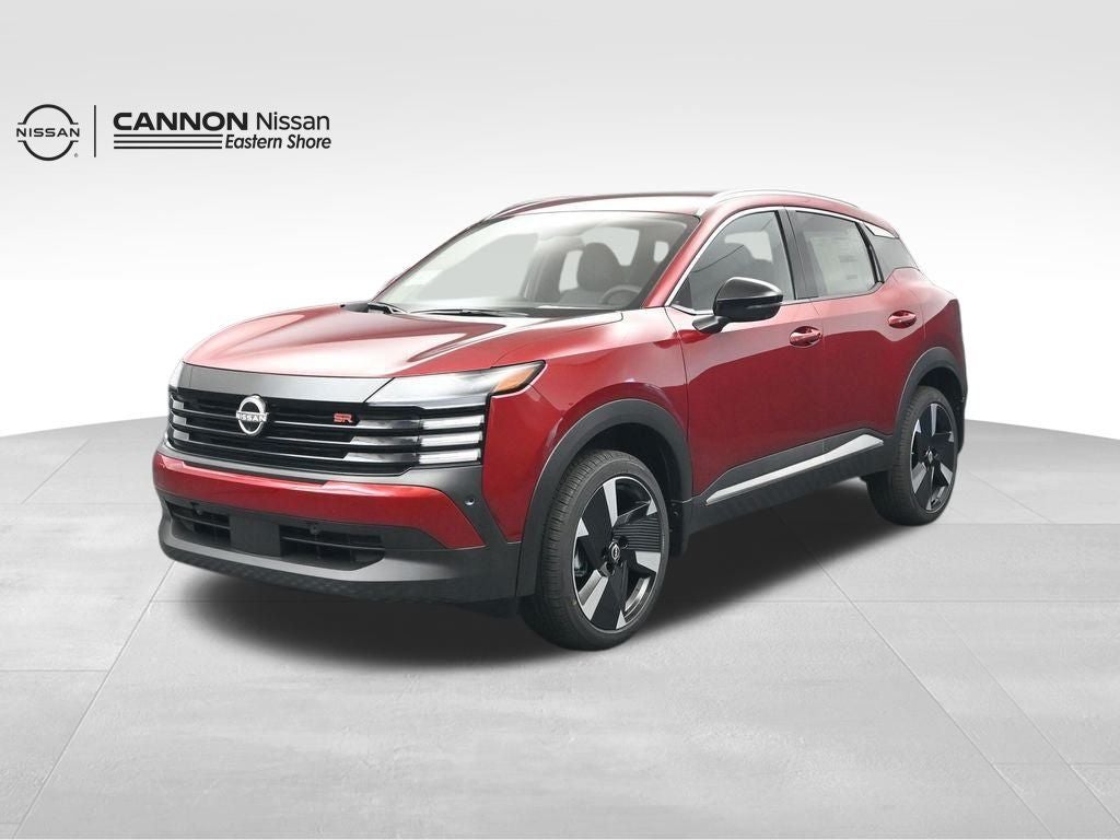 2026 Nissan Kicks SR in Scarlet Ember Tintcoat — front three-quarter view