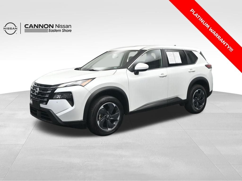 2024 Nissan Rogue SV in Everest White Pearl — front three-quarter view