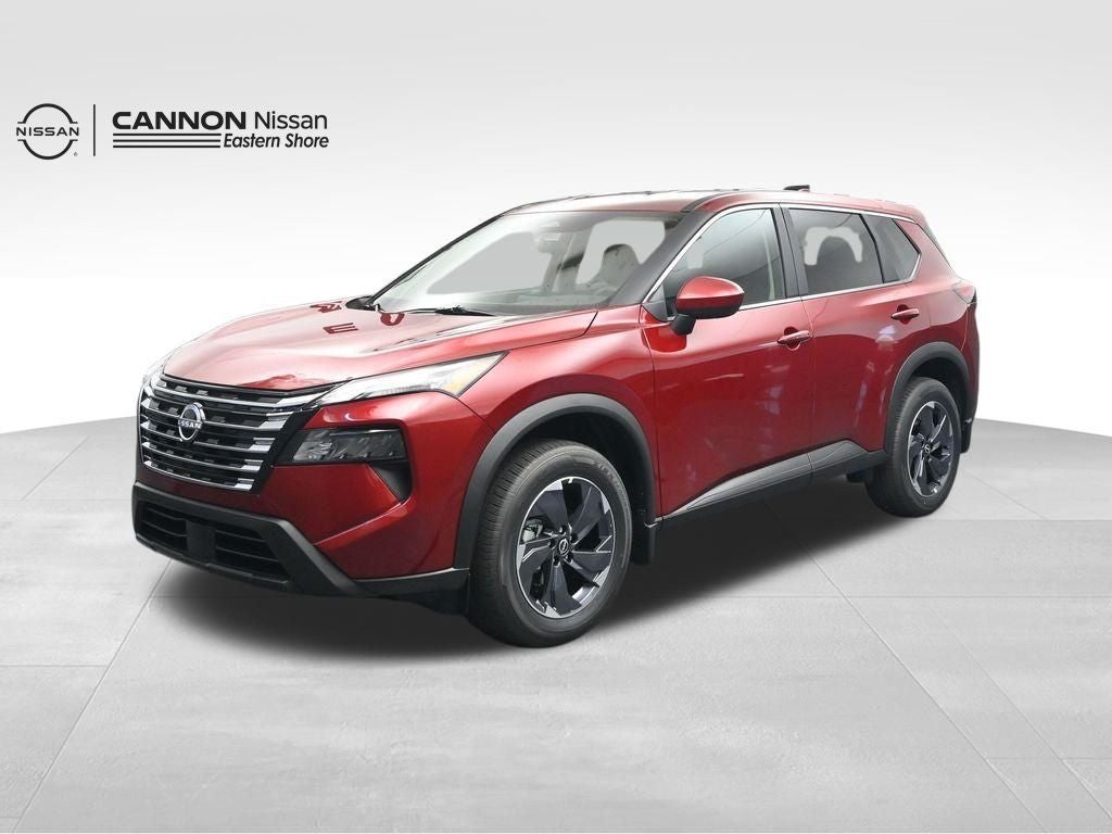 2026 Nissan Rogue SV in Scarlet Ember Tintcoat — front three-quarter view