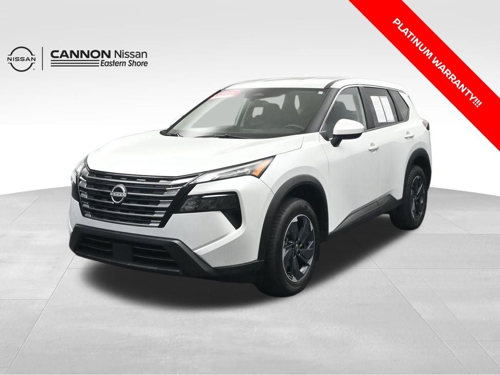 2025 Nissan Rogue SV in Everest White Pearl — front three-quarter view