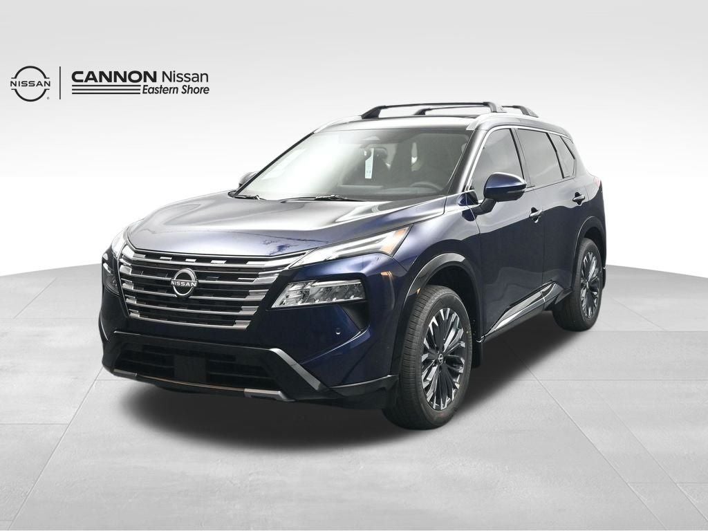 2026 Nissan Rogue Platinum in Deep Ocean Blue Pearl — front three-quarter view