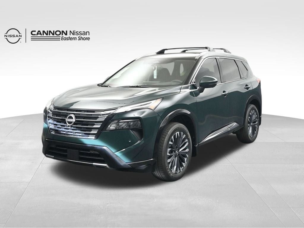 2026 Nissan Rogue Platinum in Obsidian Green — front three-quarter view