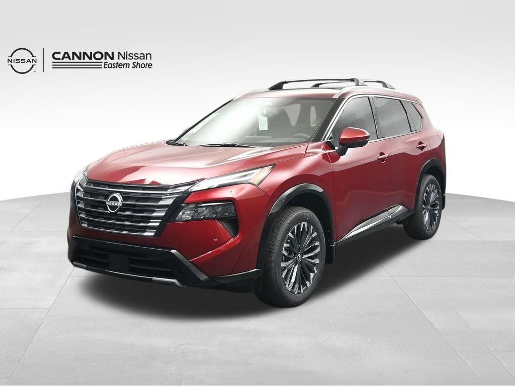2026 Nissan Rogue Platinum in Scarlet Ember Tintcoat — front three-quarter view
